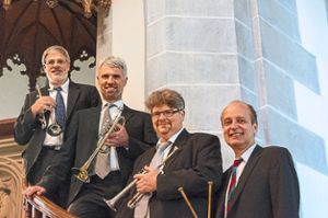 Christian Nägele, Joachim Jung und Johannes Knoblauch (von links)  bilden das Trompetensemble Stuttgart.   Tobias Horn (rechts) spielt Orgel. Foto: Veranstalter Foto: Schwarzwälder-Bote