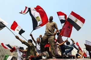 Breite Unterstützung der Bevölkerung: Unterstützer der ägyptischen Muslimbrüder demonstrieren auf dem Tahrir-Platz in Kairo für Foto: EPA