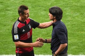 Miroslav Klose, Joachim Löw: Abschied nach der WM? Foto: dpa