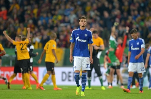 Des einen Freud, des anderen Leid: Dresden bejubelt den sensationellen 2:1-Sieg gegen Schalke. Foto: dpa-Zentralbild