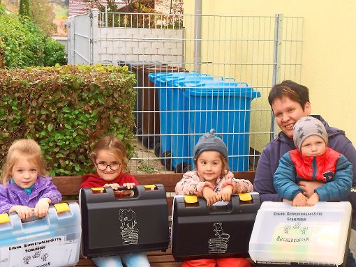 In Beschlag genommen haben die Kinder der Kita Schmiden die Lesekoffer.   Foto: Privat Foto: Schwarzwälder-Bote