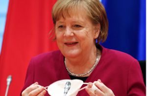 Bundeskanzlerin Angela Merkel zeigt sich erfreut über die aktuelle Corona-Entwicklung. Foto: dpa/Michele Tantussi
