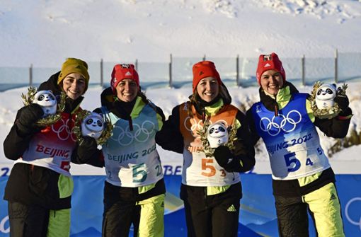 Vanessa Voigt,   Vanessa Hinz,   Franziska Preuss  und  Denise Herrmann holen die Bronze-Medaille im Teamsprint. Foto: AFP/TOBIAS SCHWARZ