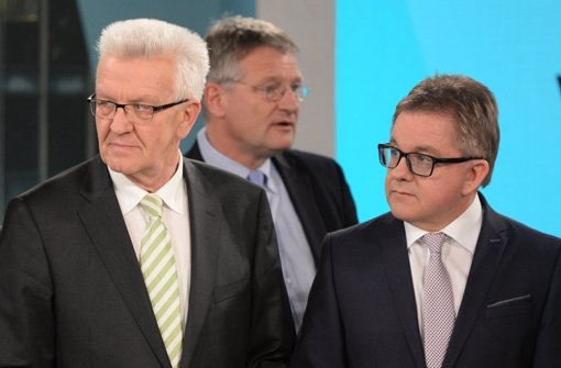 Müssen sich Winfried Kretschmann (links) und  Guido Wolf (rechts) zusammenraufen? Im Hintergrund Jörg Meuthen von der AfD. Foto: dpa