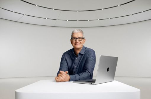 Apple-Chef Tim Cook kann zufrieden sein. Foto: AFP/Handout