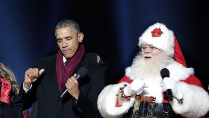 Obama wagt ein Tänzchen mit Santa Claus