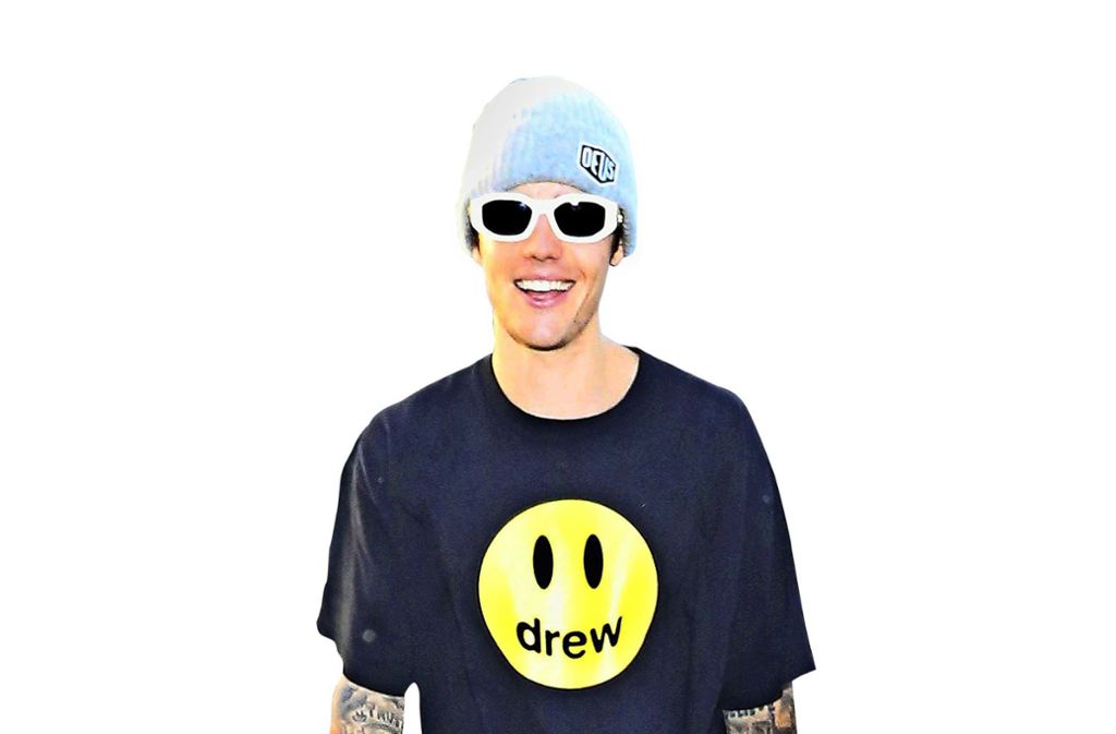Justin Bieber mit T-Shirt seiner eigenen Modelinie.