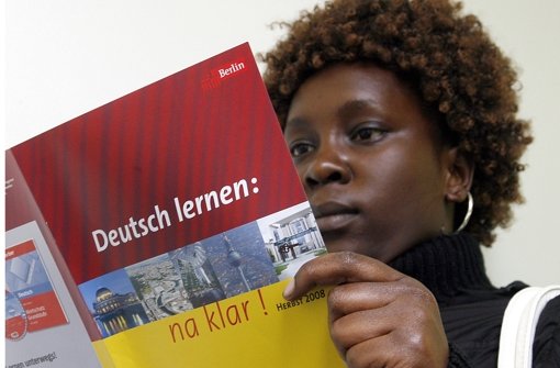 Berufsbezogene Deutschkurse sollen Migranten den einstieg in den Arbeitsmarkt erleichtern Foto: dpa