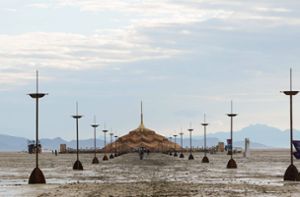 Das „Burning Man“ versinkt im Schlamm. Foto: IMAGO/USA TODAY Network/IMAGO/Trevor Hughes