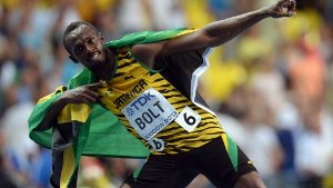 Usain Bolt feiert 100-Meter-Sieg im Regen