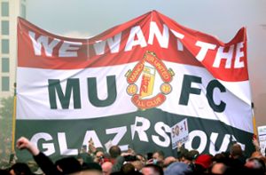 Proteste der Fans von Manchester United gegen die Investoren-Familie Glazer. Foto: dpa/Barrington Coombs