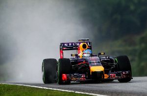 Bei der verregneten Qualifikation zum Großen Preis von Malaysia verpasst Vettel knapp die Pole Position. Foto: dpa