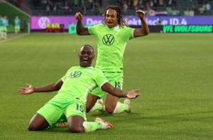 Drei Spiele, drei Siege – der VfL Wolfsburg ist Tabellenführer. Foto: AFP/RONNY HARTMANN