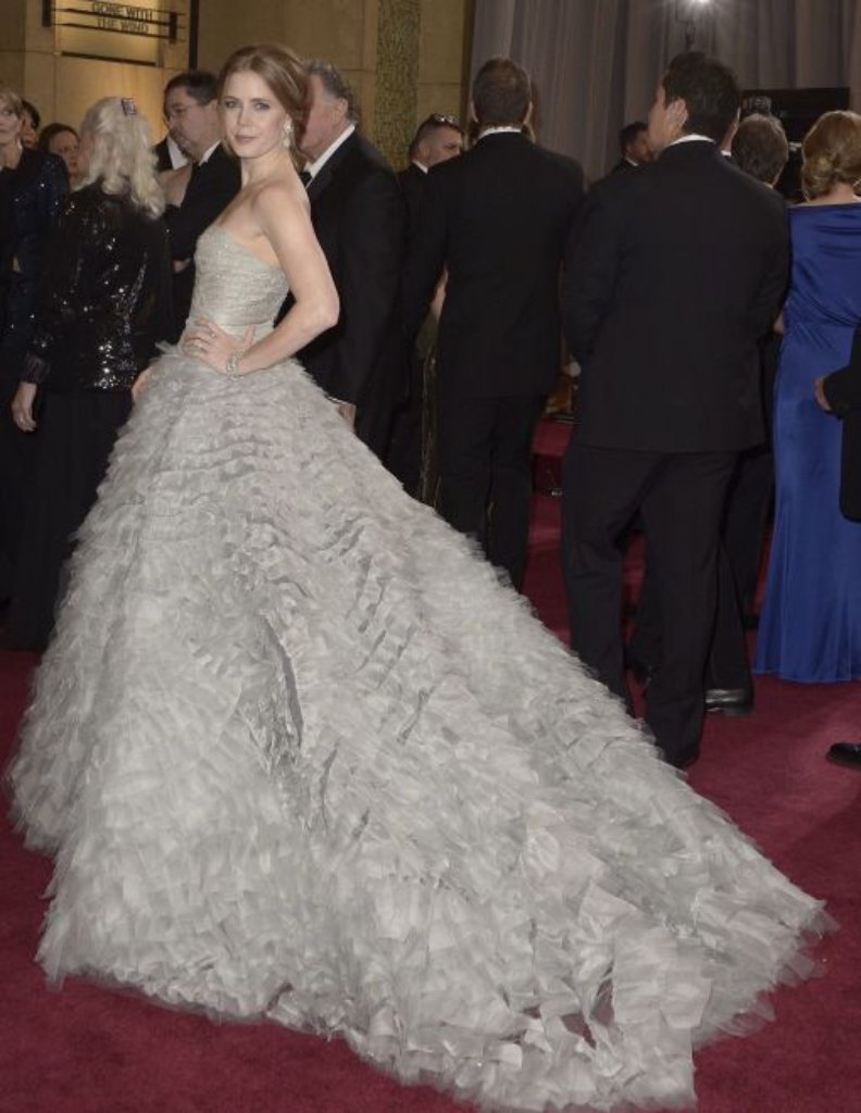 Amy Adams (nominiert als beste Nebendarstellerin für “The Master”) strahlte in einem ausladenden Kleid in zartem Mint von Oscar de la Renta.