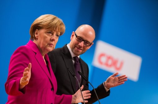 CDU-Chefin Angela Merkel und ihr Generalsekretär Peter Tauber Foto: dpa