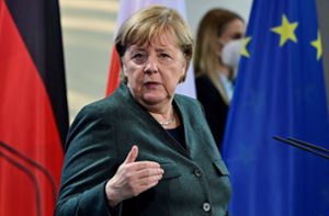 Merkel ist für die allgemeine Impfpflicht. Foto: dpa/John Macdougall