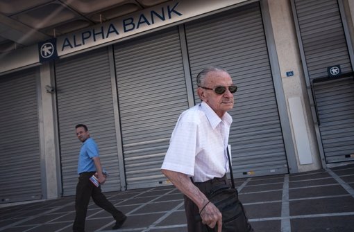 Griechen bangen um ihre Bankguthaben. Foto: dpa