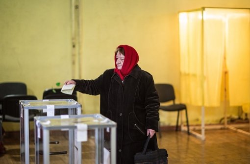Auf der zur Ukraine gehörenden Schwarzmeerhalbinsel Krim hat das Referendum über den Beitritt zu Russland begonnen.  Foto: dpa