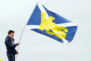 Soll sich Schottland vom Vereinigten Königreich lossagen? Demonstranten machen sich in Edinburgh für das Unabhängigkeitsreferendum stark. Foto: dpa