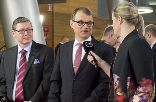 Neuer Ministerpräsident in Finnland wird voraussichtlich Zentrums-Chef Juha Sipilä (Mitte). Foto: COMPIC