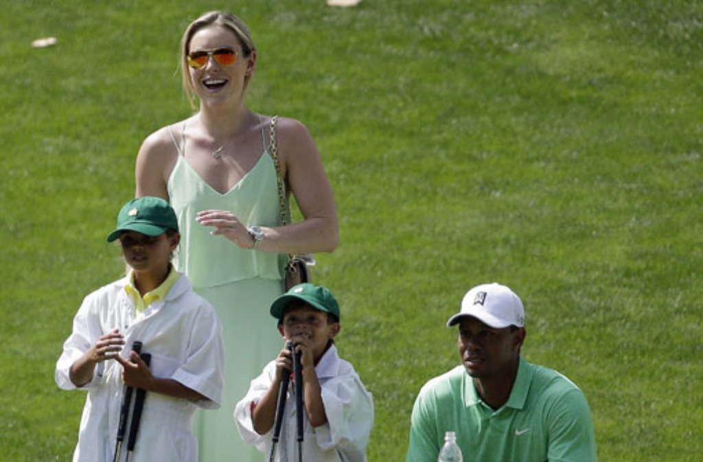 Entspannt auf dem Grün: Golfstar Tiger Woods mit seiner Freundin Lindsey Vonn und seinen Kindern Sam und Charlie.