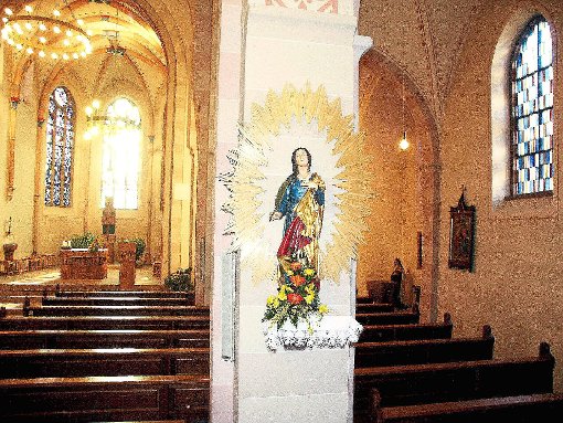 Ein Kunstwerk der Heiligen Agatha ziert die katholische Kirche in Salzstetten. Foto: Maier Foto: Schwarzwälder-Bote