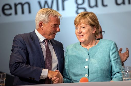 CDU-Landeschef Thomas Strobl zeigt sich gern mit der Kanzlerin – hier in Heilbronn Mitte August Foto: dpa