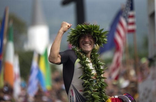 Total im Glück: Sebastian Kienle hat den Ironman auf Hawaii gewonnen. Foto: dpa