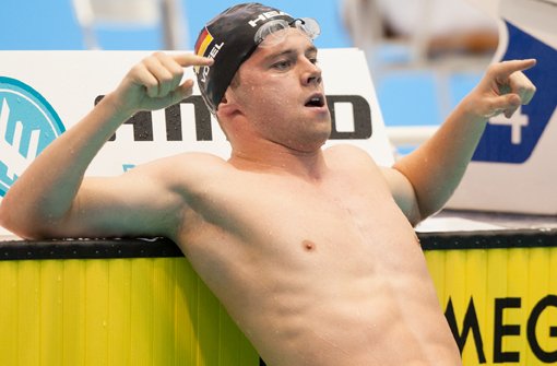 Der deutsche Schwimmer Florian Vogel wird zum Lebensretter.  Foto: dpa